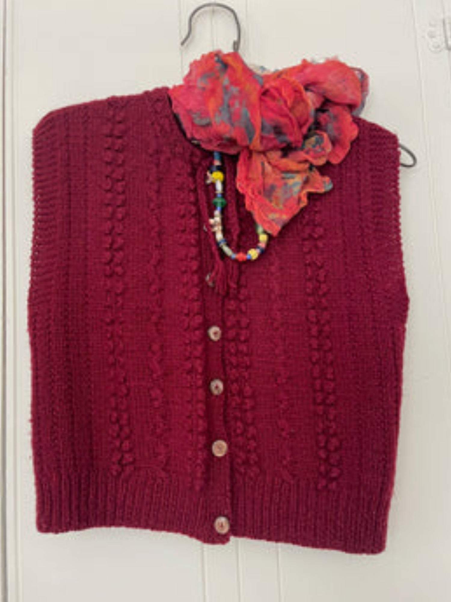Rosie's burgundy sweater vest