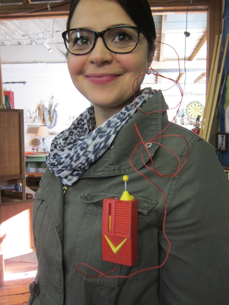 Women Wearing Vintage Toy Walkie Talkie