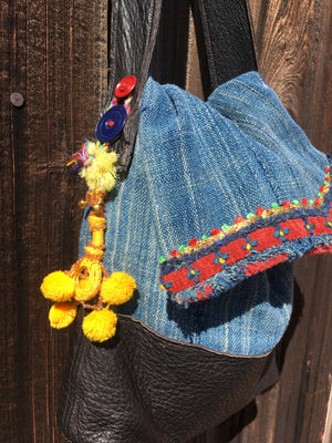 Sustainable indigo boho tote bag made from upcycled materials.