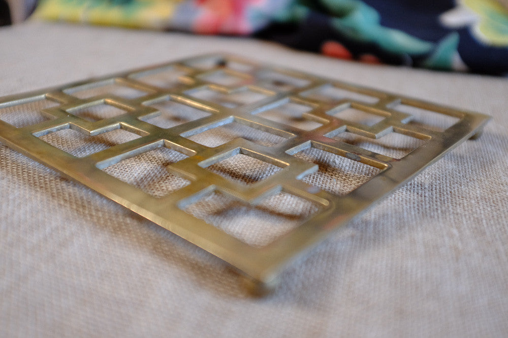 Mid-century Asian-style brass trivet