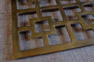 Mid-century Asian-style brass trivet