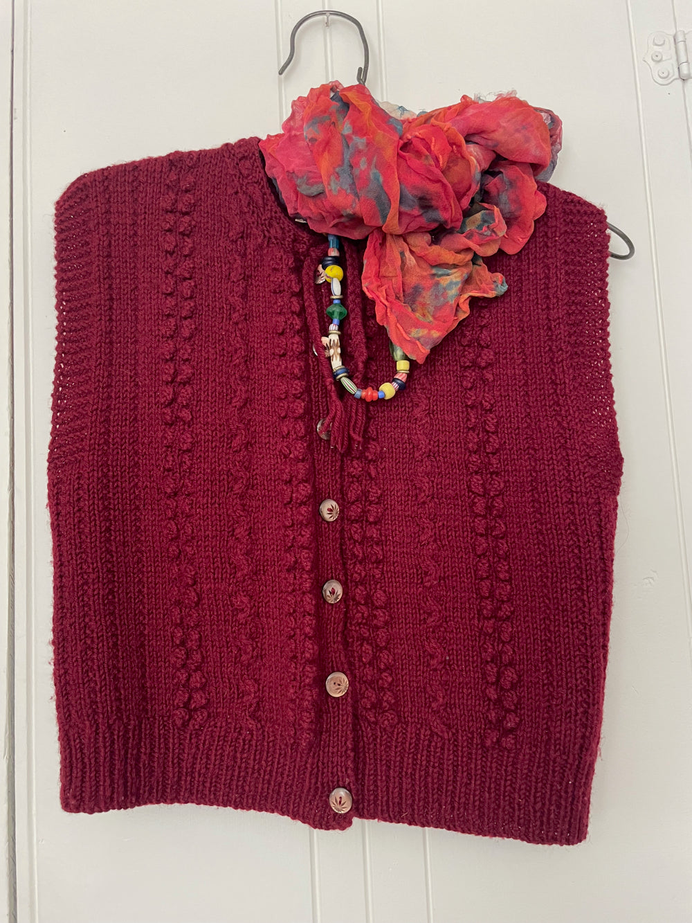 Rosie's burgundy sweater vest