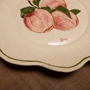 Vintage scalloped dessert plate with hand-painted peaches.