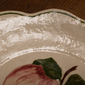 Vintage scalloped dessert plate with hand-painted peaches.